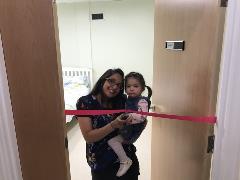 Meera and Maia Cutting the ribbon
